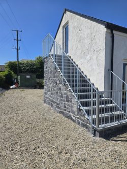 stairwell front of building in Coleraine by Panda-engineering